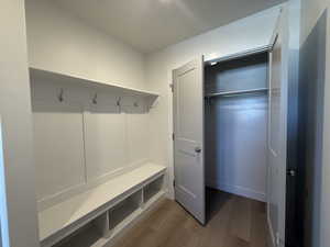Mudroom featuring wood finished floors
