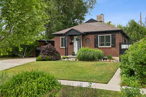 View of house with mature landscaping