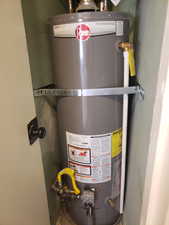 Utilities with strapped water heater