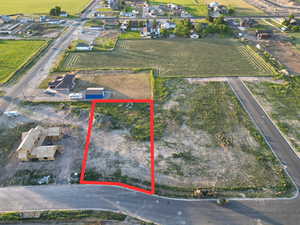 Aerial view of property and surrounding area with property boundaries highlighted