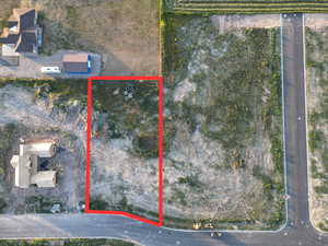 Aerial view of property and surrounding area with property boundaries highlighted