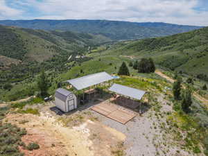 View of subject property with mountains