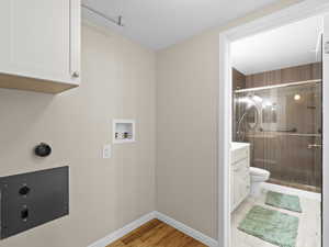 Laundry area with cabinet space and washe/dryer hookup