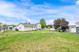View of fenced backyard