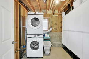 Laundry area with estacked washer and dryer