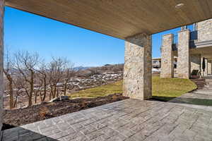 View of patio / terrace featuring a mountain view