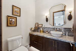 Bathroom featuring vanity and tile patterned floors