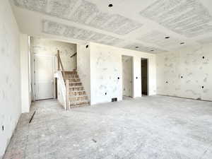 Empty room featuring stairs