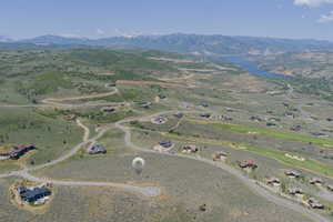Aerial overview of property's location with a mountain backdrop