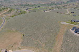 Aerial view of property and surrounding area with rural landscape