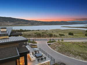 Aerial view at dusk of a water and mountain view