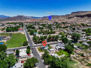 Aerial view of residential area with a mountainous background