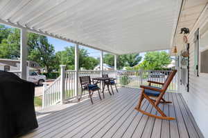 Wooden terrace with outdoor dining space
