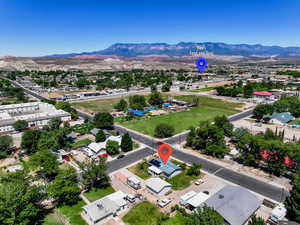 Aerial view of residential area featuring mountains