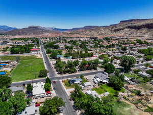 Aerial view of residential area with a mountainous background
