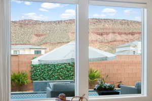 Doorway to outside with a mountain view