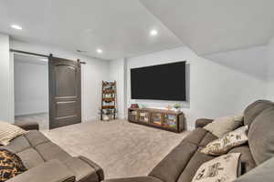 Large basement family room, entrance to a bonus room