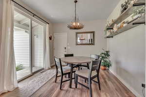 Dining room, with outside entrance and door to garage.