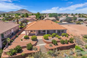 Aerial view of residential area featuring a mountain backdrop