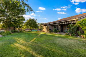 View of yard with a patio area