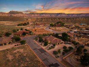 Aerial perspective of suburban area featuring a mountainous background