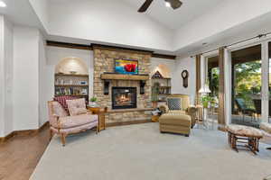 Great Room Hub with a Floor-to-Ceiling Stone Fireplace