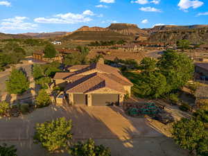 View from above of property with a mountainous background
