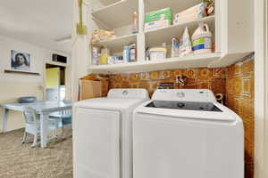Laundry room with washer and dryer