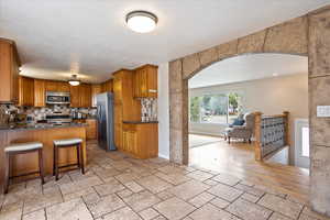 Kitchen with granite counters and stainless appliances