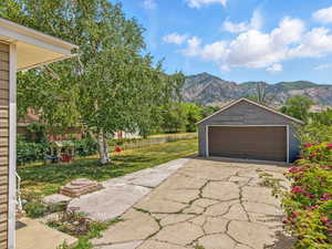 Detached garage with a mountain view