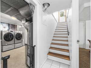 Stairs with washer and clothes dryer
