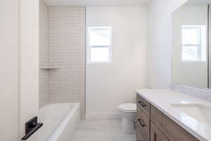 Full bath with vanity and shower / bathtub combination
