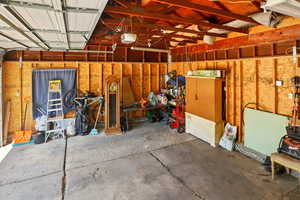 Garage featuring a garage door opener
