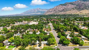 Aerial view of residential area with a mountain backdrop