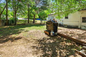 View of yard featuring a deck