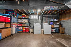 Basement featuring washer and dryer, good ceiling height with room to finish another bedroom or family room and bathroom