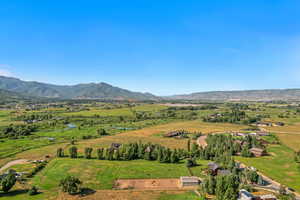Overview of rural landscape with a mountainous background