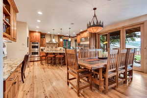 Dining room featuring recessed lighting and light wood-style flooring