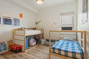 Bedroom featuring wood finished floors