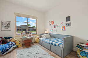 Bedroom featuring wood finished floors