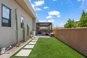 Fenced backyard featuring a patio area