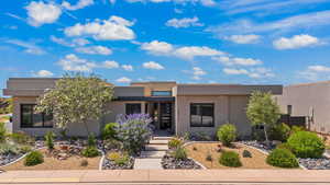 View of front facade with stucco siding