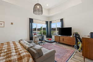 Living room featuring light wood-style floors and recessed lighting