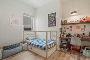 Bedroom featuring wood finished floors
