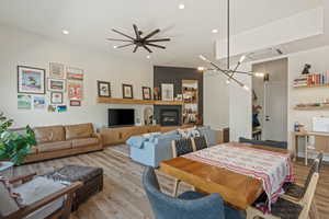 Dining area with light wood-style flooring, ceiling fan, and recessed lighting