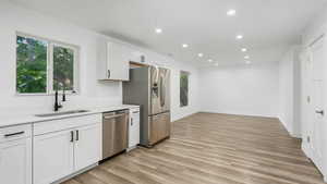 Open concept kitchen with living room area.