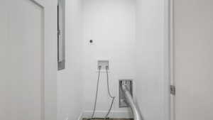 Laundry room with hookup for a washing machine and hookup for an electric dryer