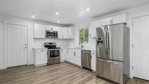 Kitchen with stainless steel appliances.