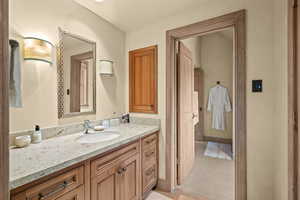 Bathroom with vanity and tile patterned flooring