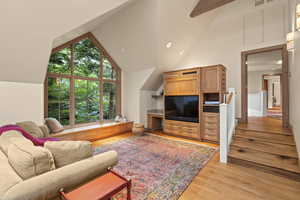 Living area featuring light wood-style flooring